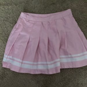 pink pleated varsity skirt